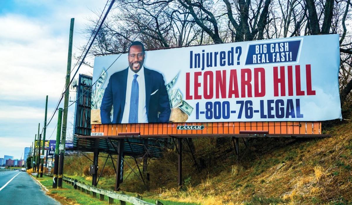 A billboard featuring Philadelphia lawyer Leonard Hill, who has been accused of shooting a man outside of a Center City cigar bar